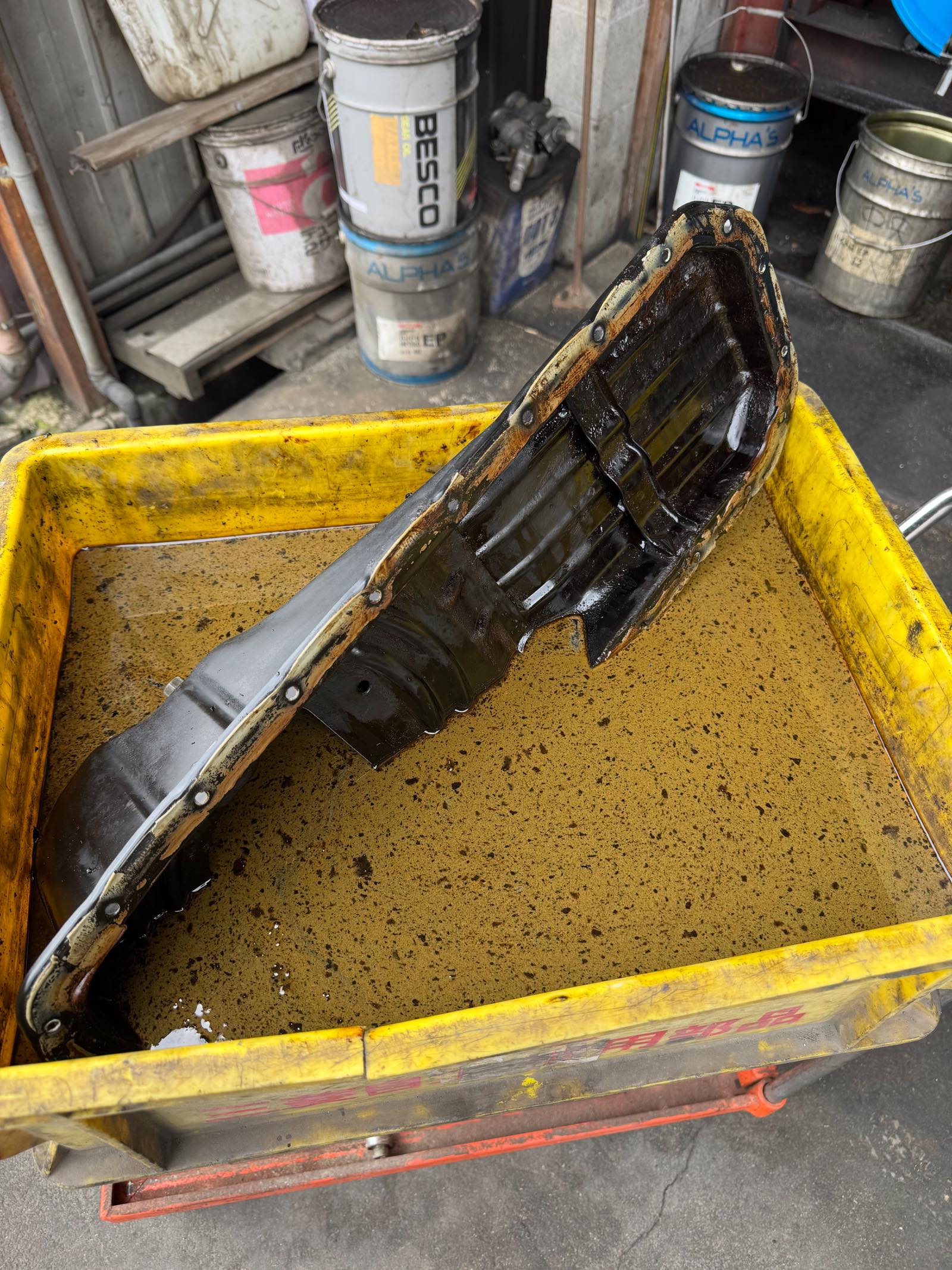 オイルスラッジの洗浄方法